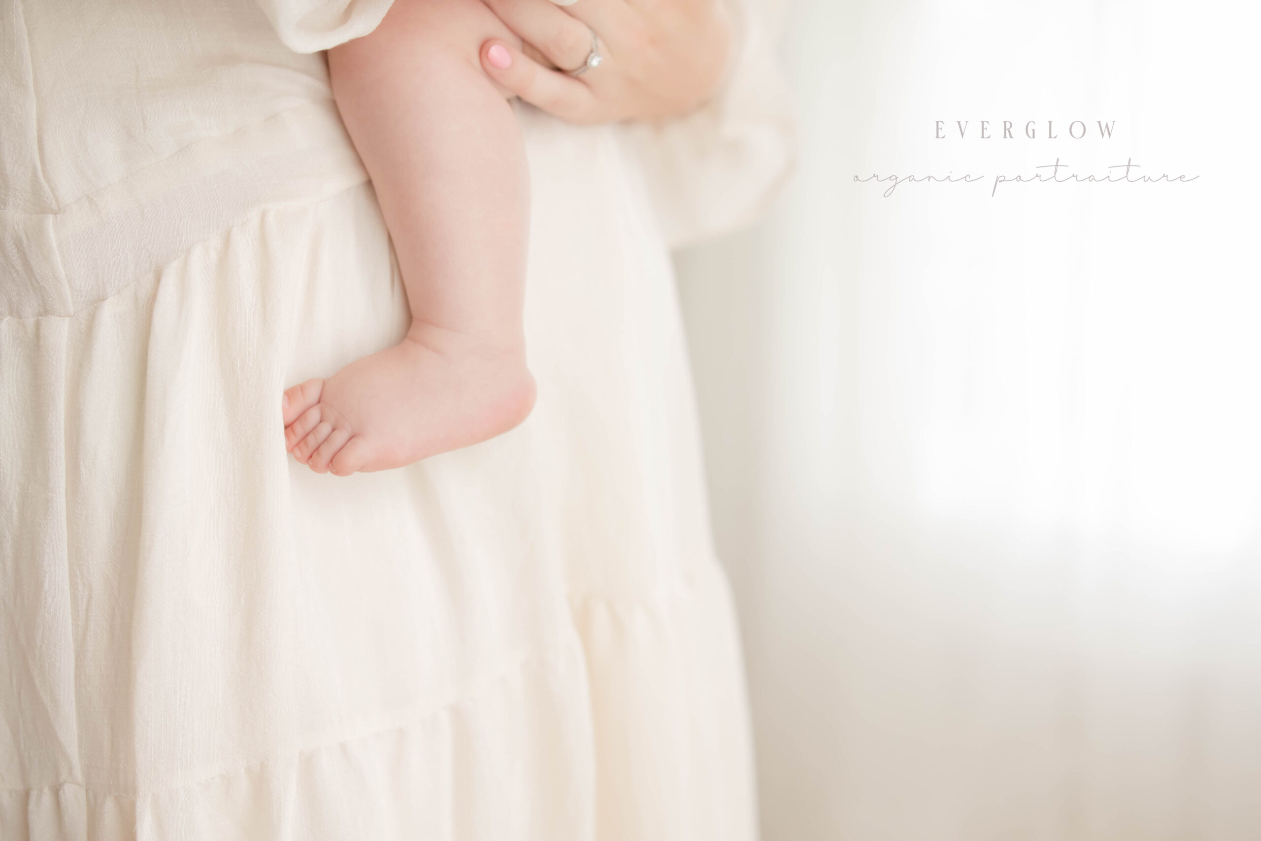 A mother daughter 9 month session in the stucio.